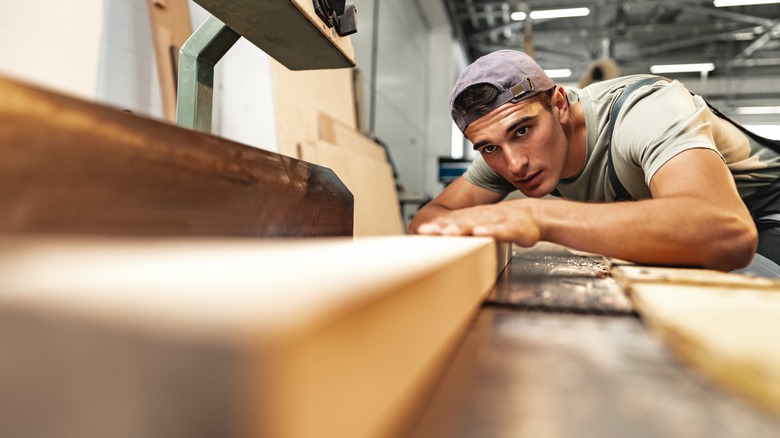 Wood Worker In A Furniture Factory