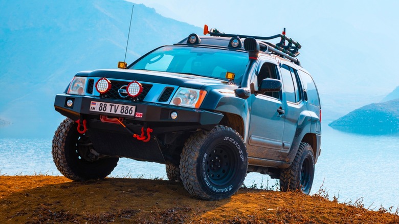 A Nissan Xterra in the wild lands.