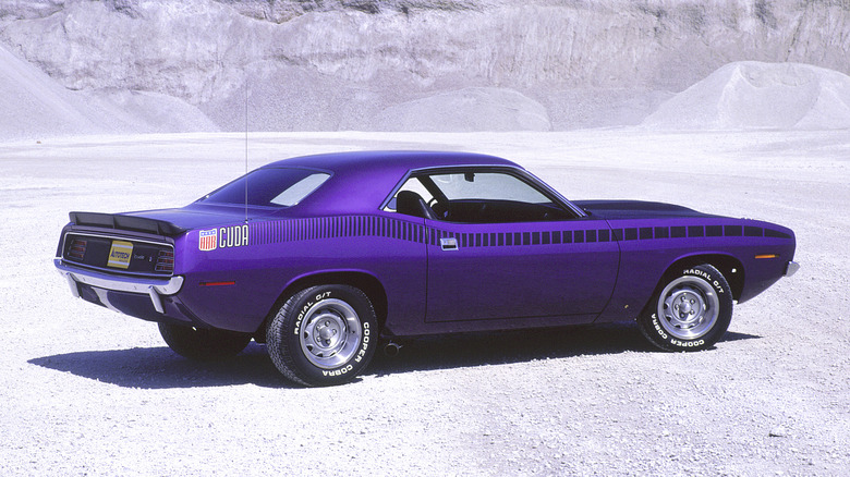 Purple Plymouth Cuda in white rocky area