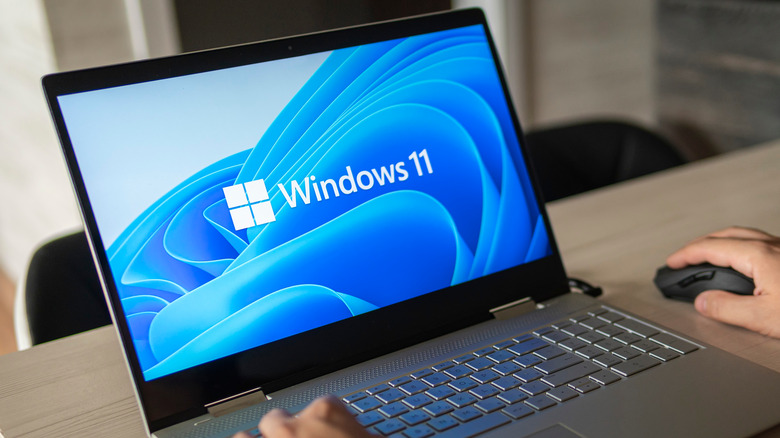 A silver laptop running Windows 11