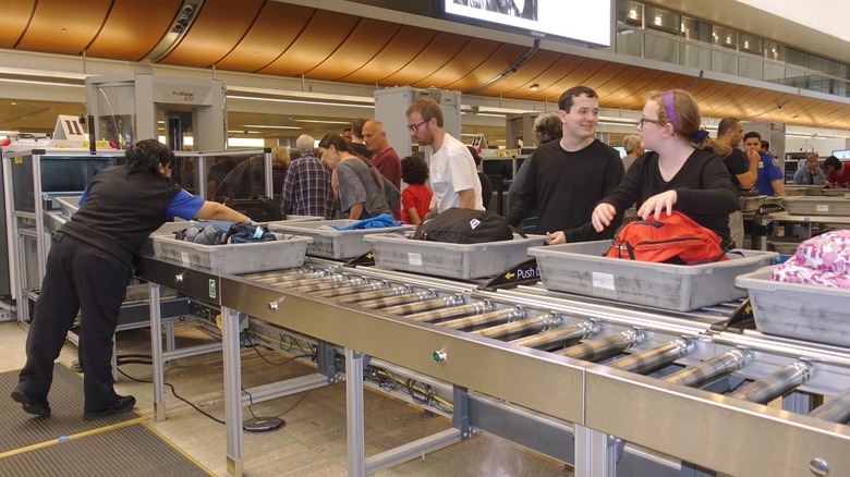 Airline passengers going through TSA