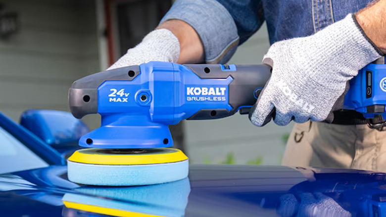 person using kobalt polisher