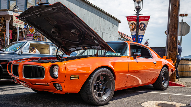 1972 Pontiac Firebird Formula parked hood open