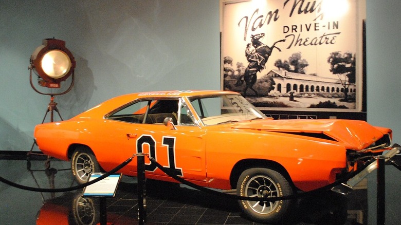 The Dukes of Hazzard General Lee Charger with nose damage on display.