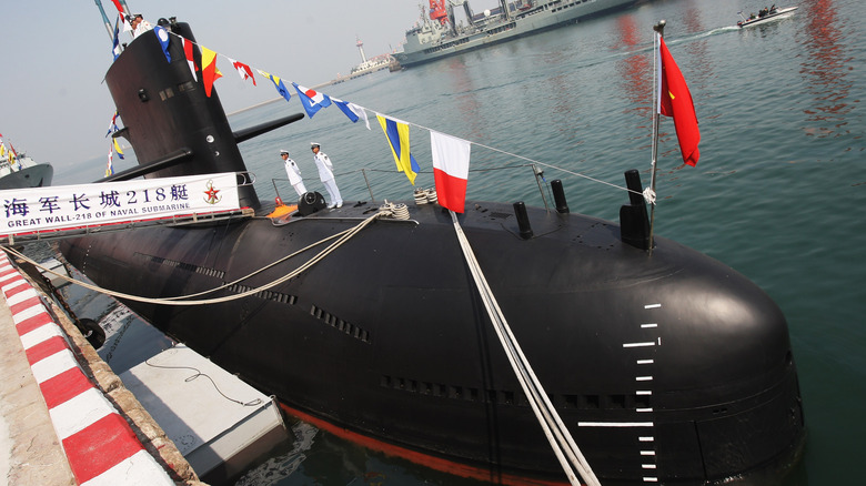 A Chinese submarine sitting in port.