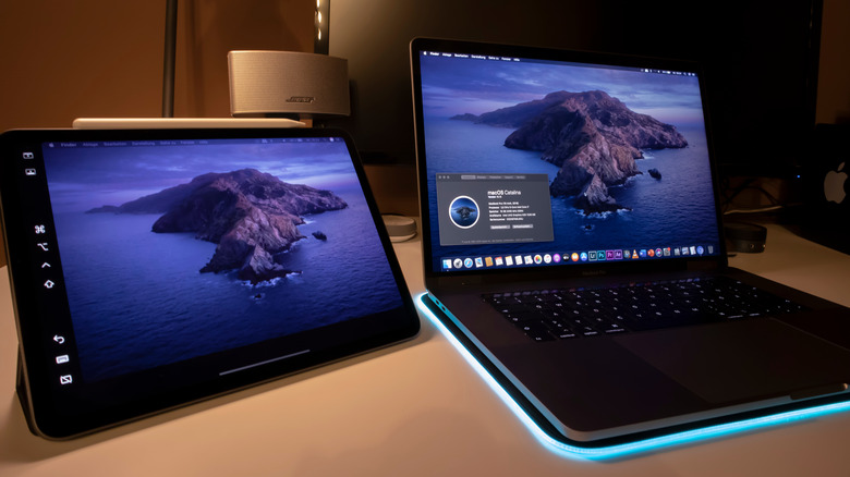 ipad and macbook on desk