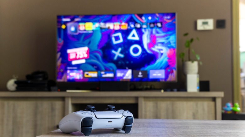 PS5 on TV with controller
