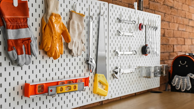 Pegboard holding tools