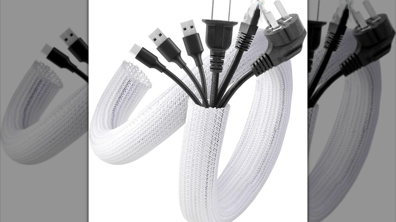 An Agptek cable sleeve holiding six cables.