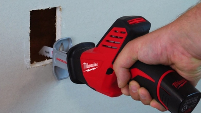 Milwaukee Hackzall cutting into drywall