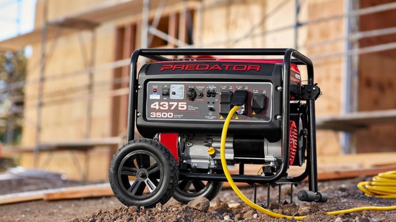 Generator sitting on gravel outside