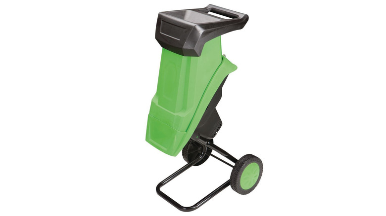 Black and green chipper shredder with white background