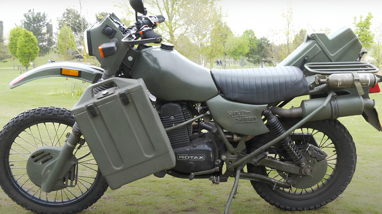 A 1994 Harley-Davidson MT350E bike parked on a field