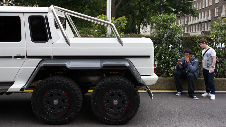 two people looking at G-wagon