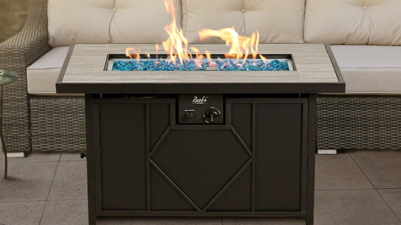 cermaic fire pit with blue stones