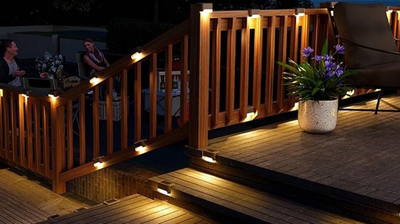 Solar lights along house deck