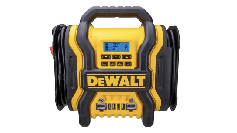 driver in the cold using DeWalt Jump Starter and Air Compressor