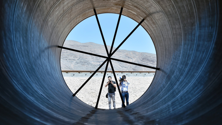 People in a hyperloop tube