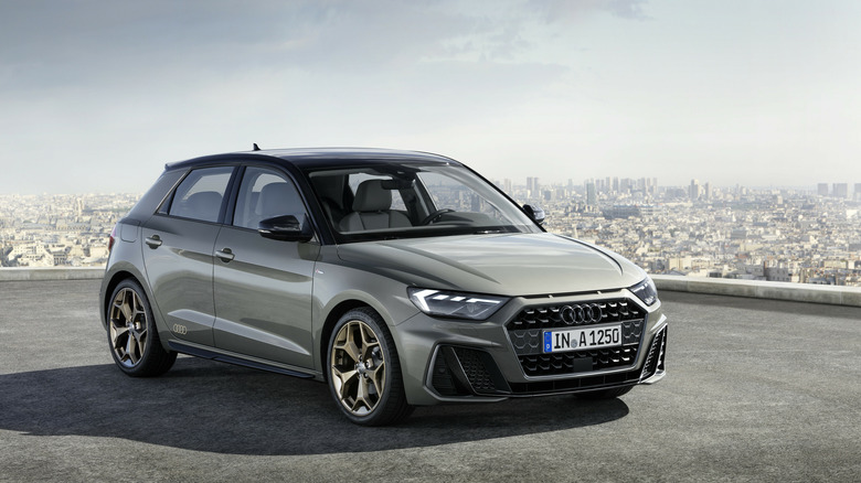 Grey Audi A1 with skyling in background