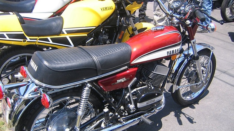 Yamaha RD350 parked in garage next to another Yamaha motorycle