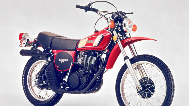 Red Yamaha XT500 against light grey background