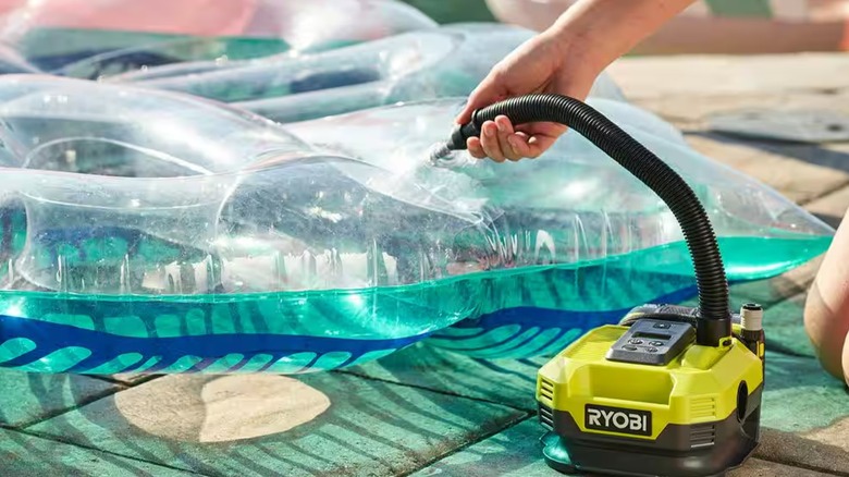 Inflating a pool toy with the Ryobi inflator/deflator