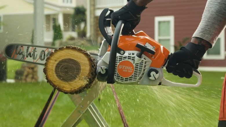 person using stihl ms 182