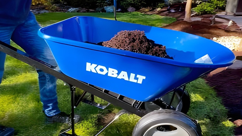 Wheelbarrow being moved