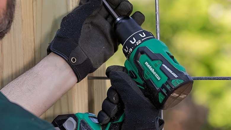 Person using Metabo drill