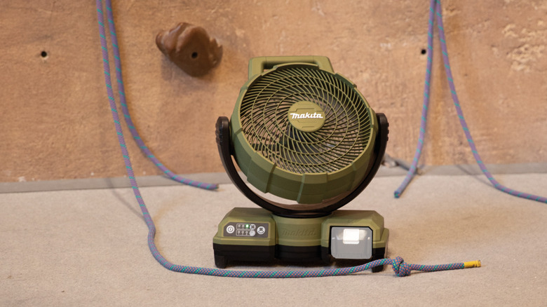 Makita fan next to a rock climbing wall