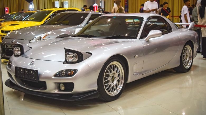 Silver Mazda RX-7 at car show