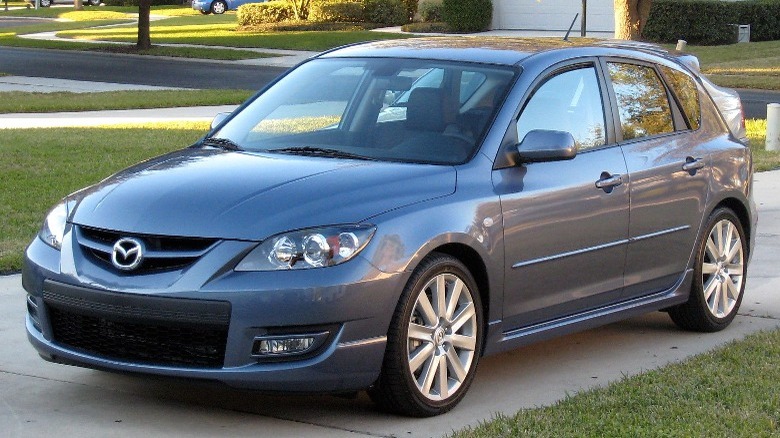 Slate-colored Mazdaspeed3 on driveway