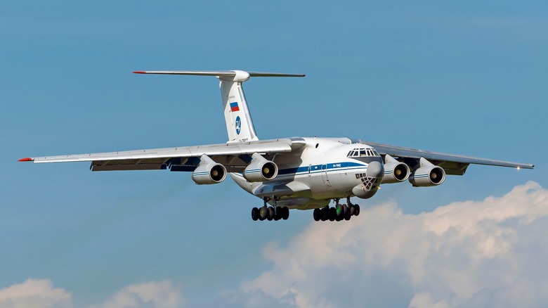 Ilyushin Il-76 fling over clouds