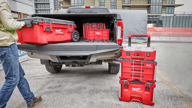 worker loading flatbed packout gear