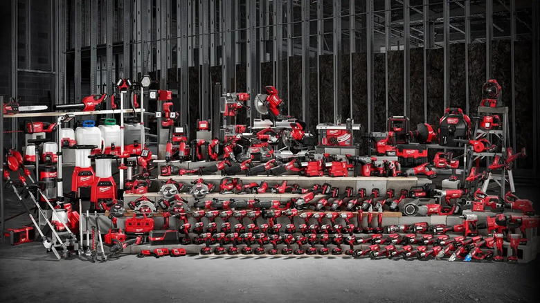 An array of Milwaukee tools lined up on display