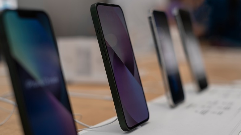 Row of smartphones in store