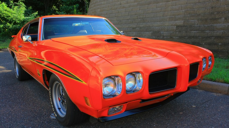 Orange Pontiac GTO parked