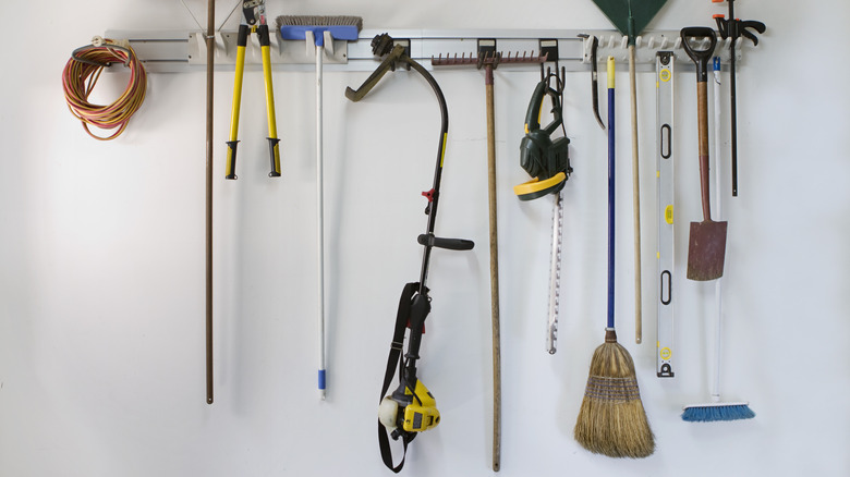 tools hanging on wall in garage