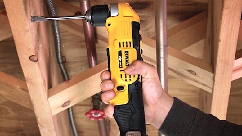 DeWalt right-angle drill being used by worker