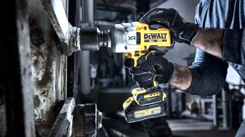 DeWalt impact wrench being used by worker