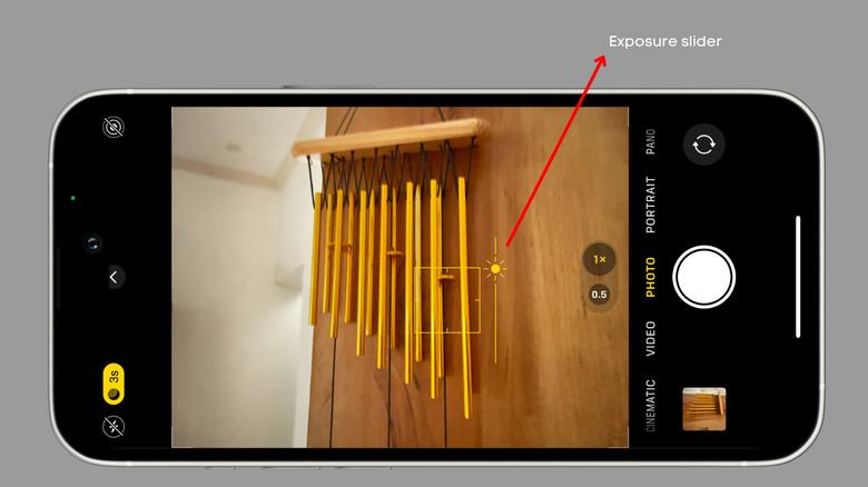 Screengrab of the Camera app with exposure slider in Night mode