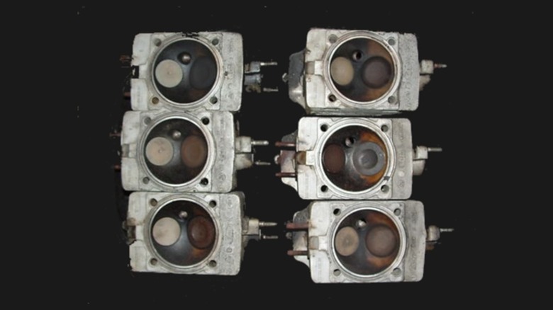 cylinder heads for the Porsche 911 showing their hemispherical combustion chambers