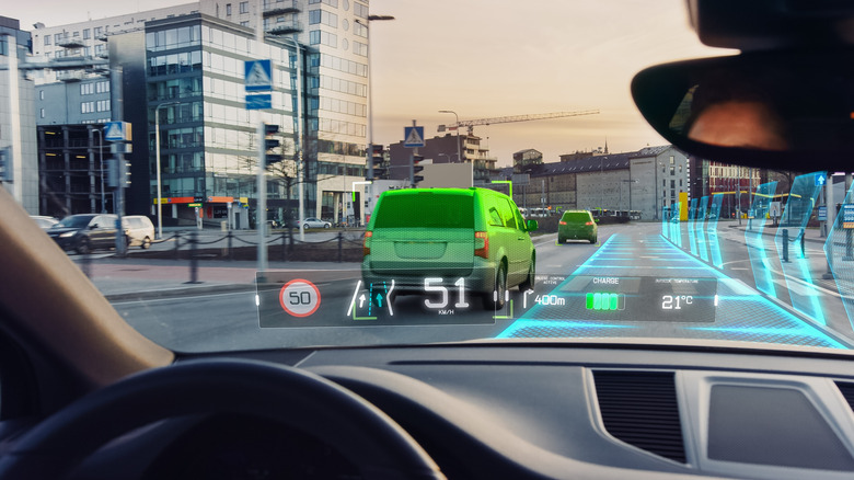 Car with heads-up display showing telemetry information on winshield