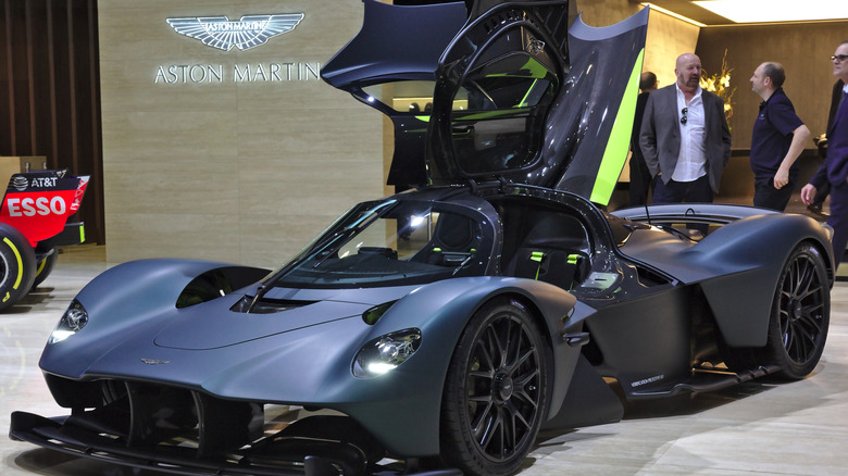 Aston Martin Valkyrie parked in exhibit area with open gullwing doors