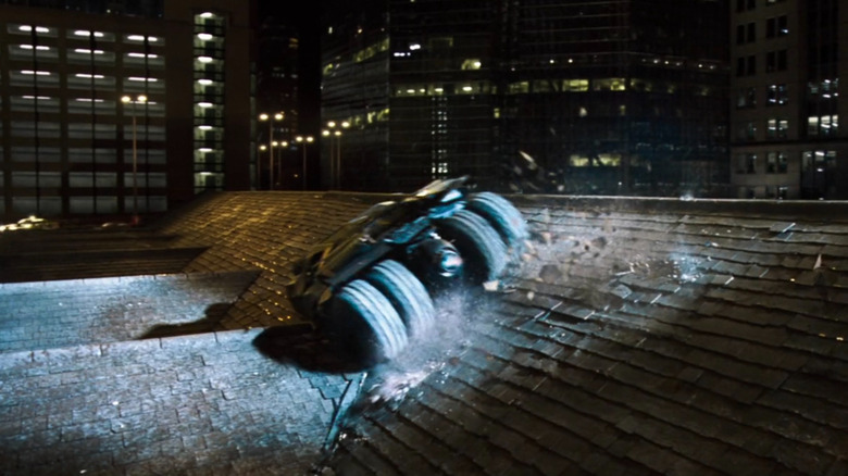 Batman Begins Batmobile driving on rooftops