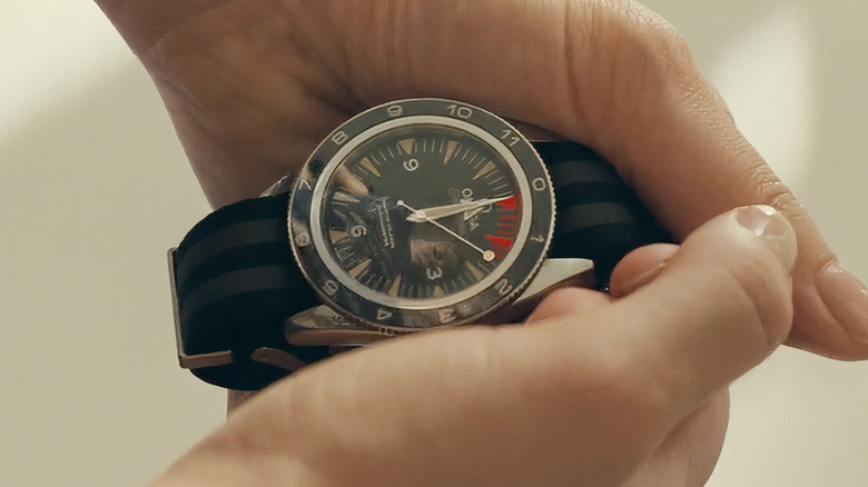 Omega Seamaster watch in hands