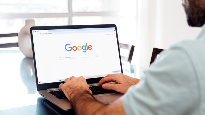 A person using Google Chrome browser on a laptop.