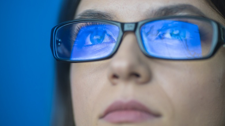 Woman wearing blue light lenses