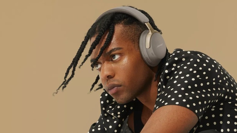 Man wearing Bose QC Ultra