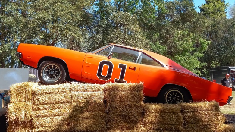 1969 Dodge Charger parked on hay bales